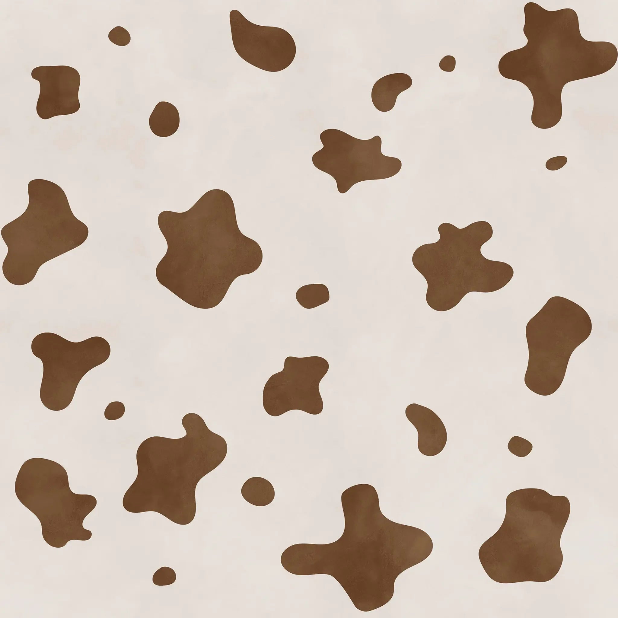 Pattern resembling cow skin in brown spots on a beige background