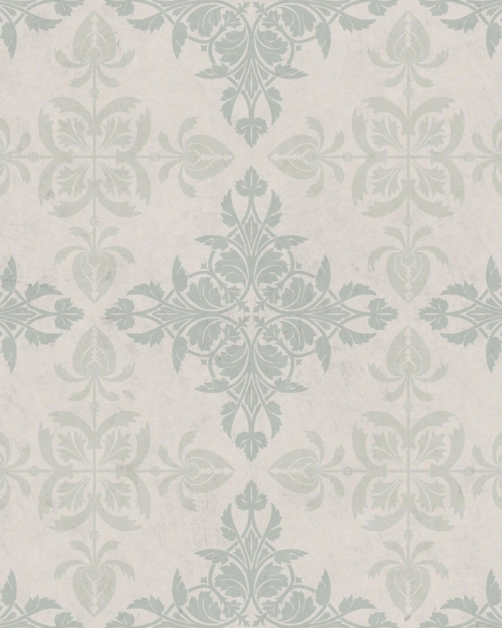 Decorative tile pattern with green leaves on a light gray background