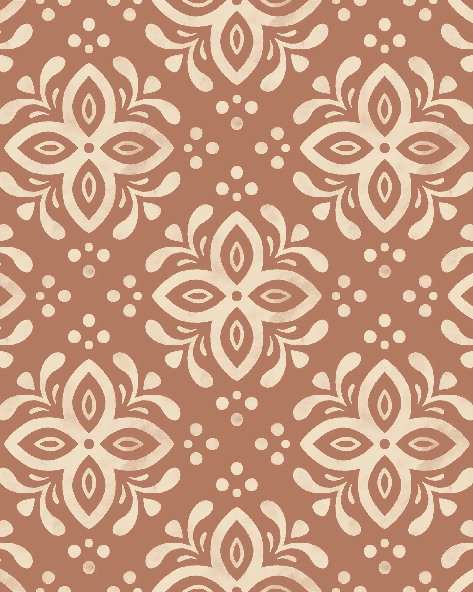 Pattern of white floral designs on a pinkish-brown background