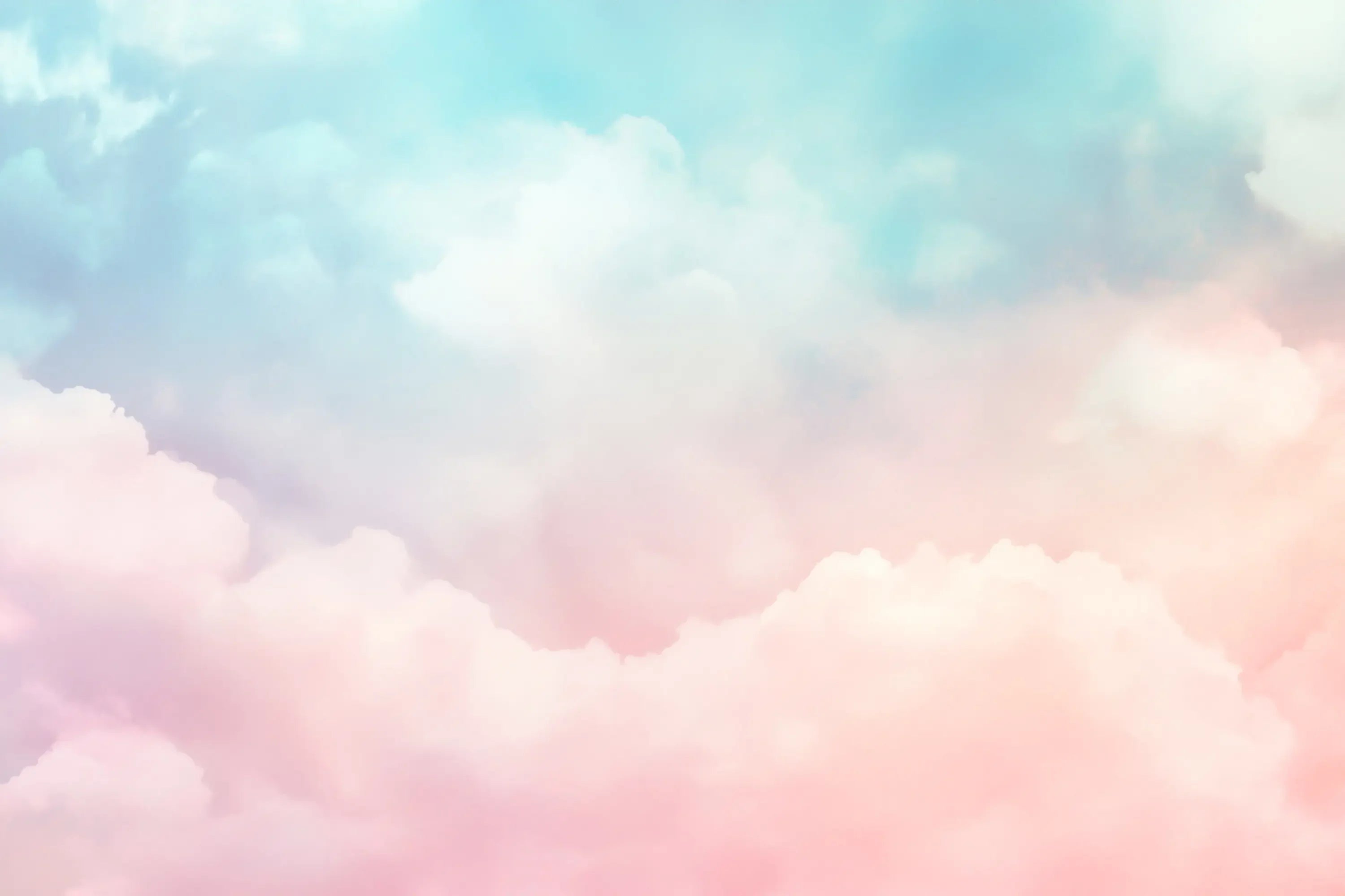 Pastel-colored clouds in a soft gradient sky