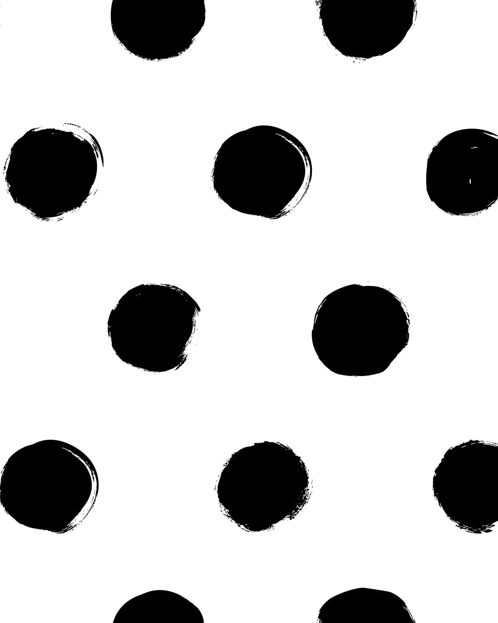 Pattern of black polka dots on a white background