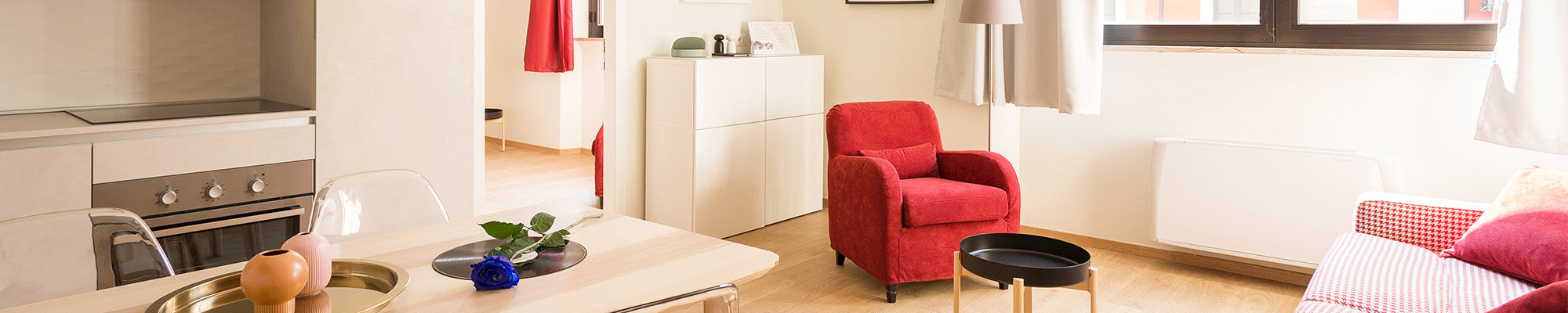 Interior design with red chair and beige colors