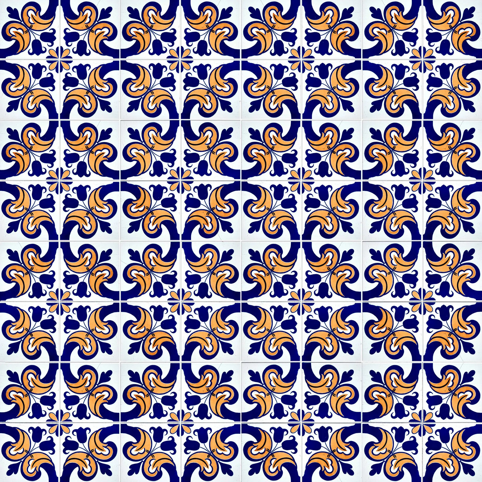 Pattern of blue and orange tiles with intricate designs on a white background